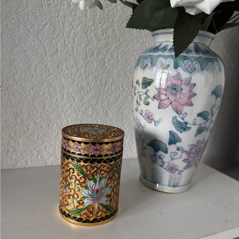 Antique Cloisonné Jar with ornaments and design details around lotus flower